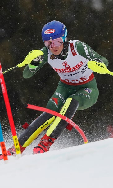 The Latest: Shiffrin fights illness in bid for slalom gold